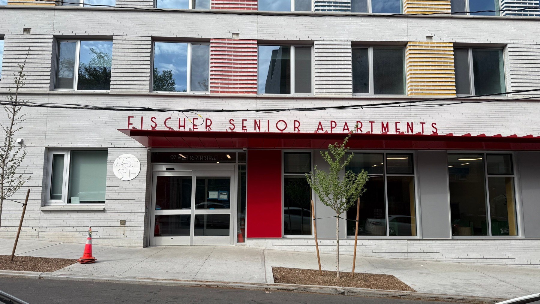Dimensional lettering above a residential building entrance